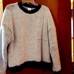 Cozy warm top, fluffy softness.